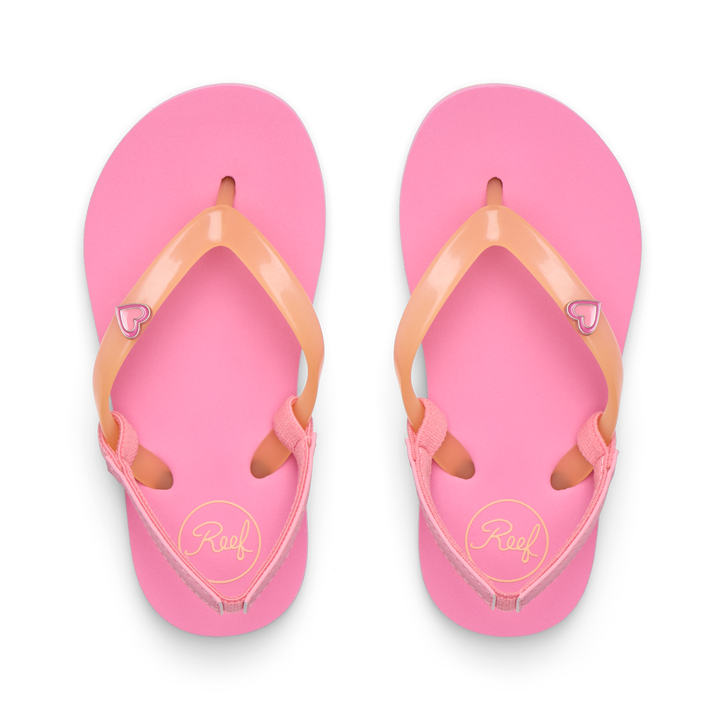Little Charming pink girls’ sandals viewed from above showing soft straps with heart detail, designed for comfort and beach wear.