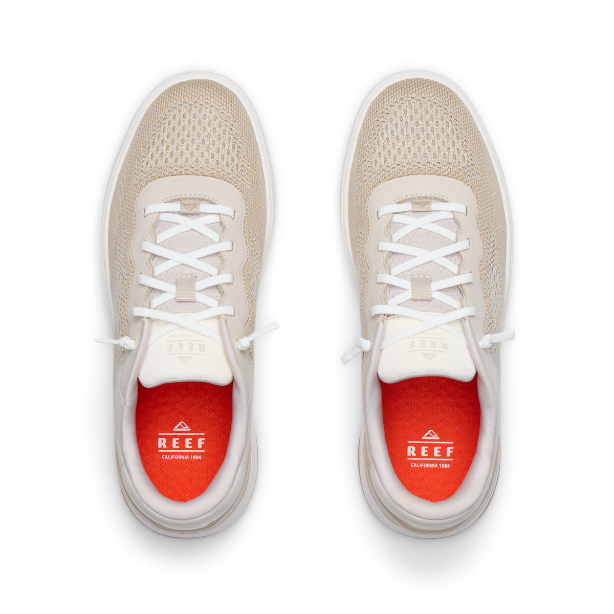 Top view close-up of Shoreline Del Mar men's shoes in white with mesh, featuring REEF branding and cushioned insoles.