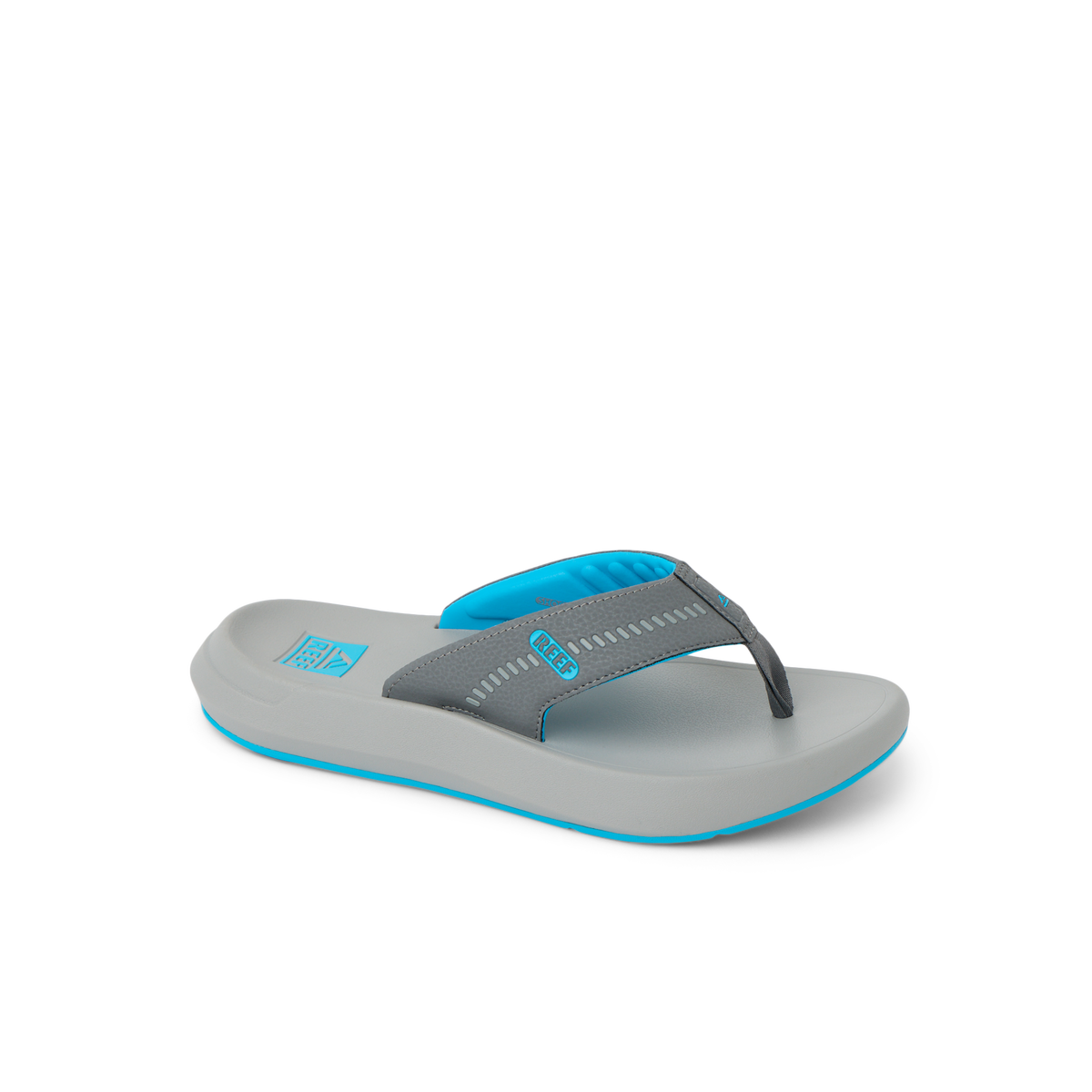 Cruiser sandal facing right, showing charcoal and aqua straps with cushioned footbed for all-day comfort.
