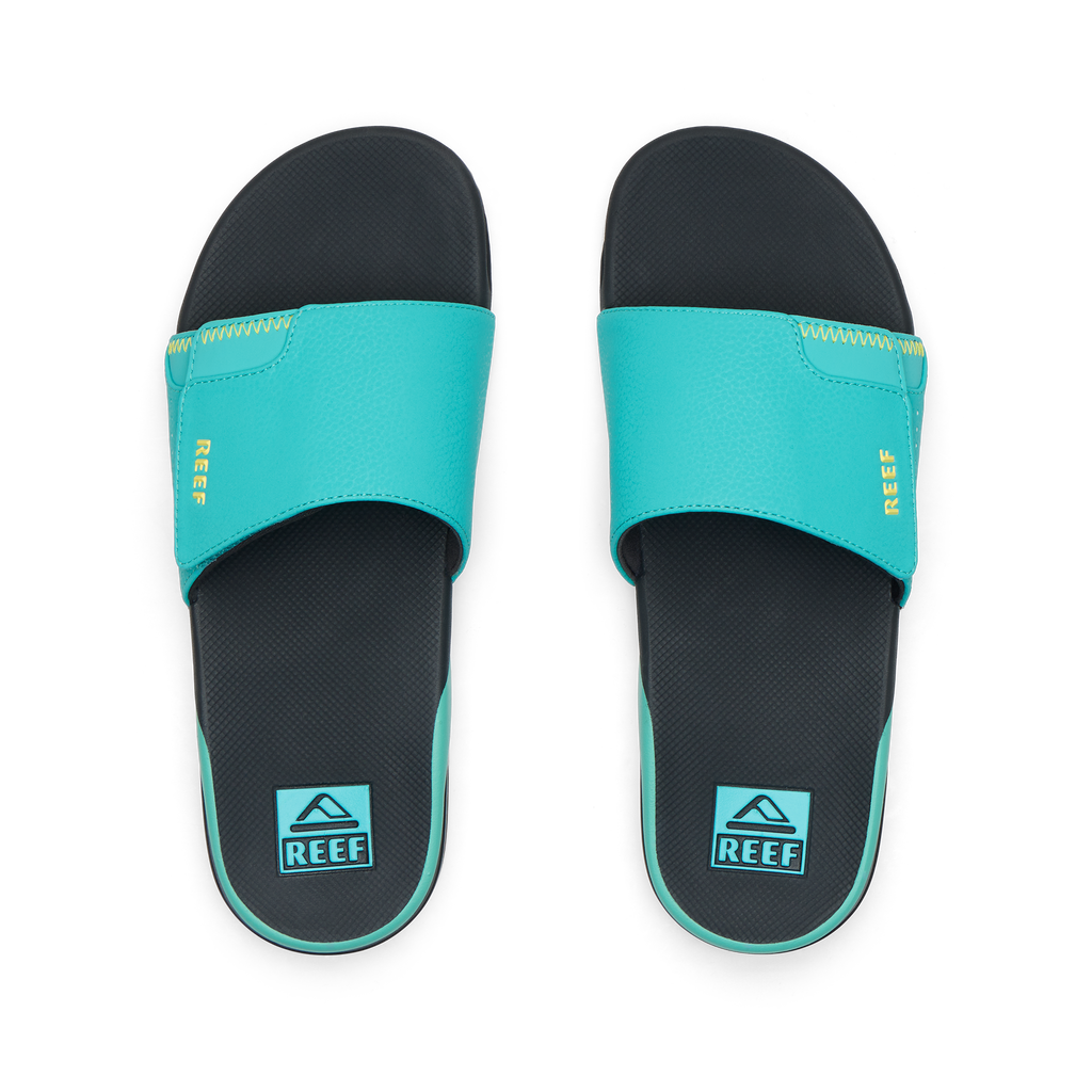Top view of teal and black men's Fanning Slide with anatomical arch support and soft cushioning for all-day comfort.