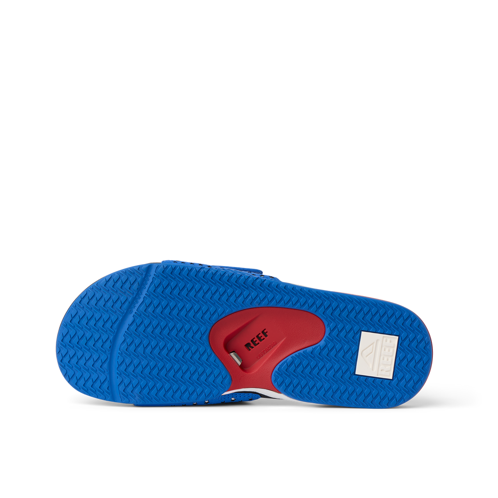 Fanning Slide men's footwear shown from the bottom facing up, highlighting water-friendly sole with arch support.