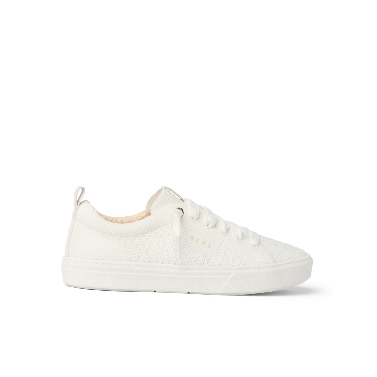 Side view of a white Lay Day Lite sneaker for women, featuring lightweight, water-friendly materials and anatomical arch support.