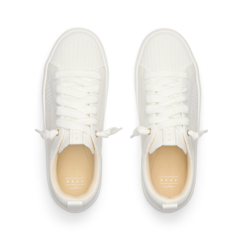 Top view of white Lay Day Lite shoes for women, featuring lightweight, breathable mesh and cushioned insoles designed for comfort.