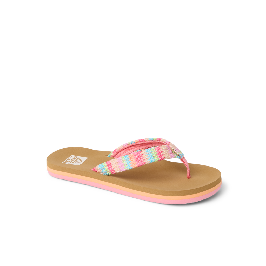 Kids Ahi sandal facing left, showing the front and side with pink, blue, and tan striped fabric straps and cushioned sole.