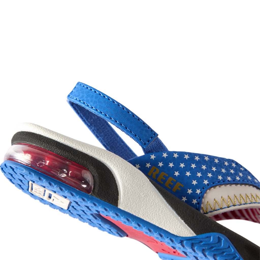 Little Fanning boys' sandal facing left, close-up of heel with air cushion and blue star-patterned strap