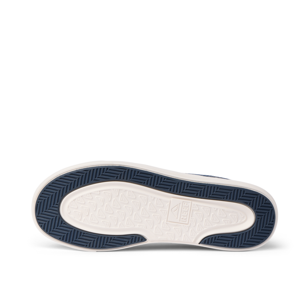 Bottom view of Neptune HT men's navy sneaker sole showing water-friendly, durable tread with arch support design