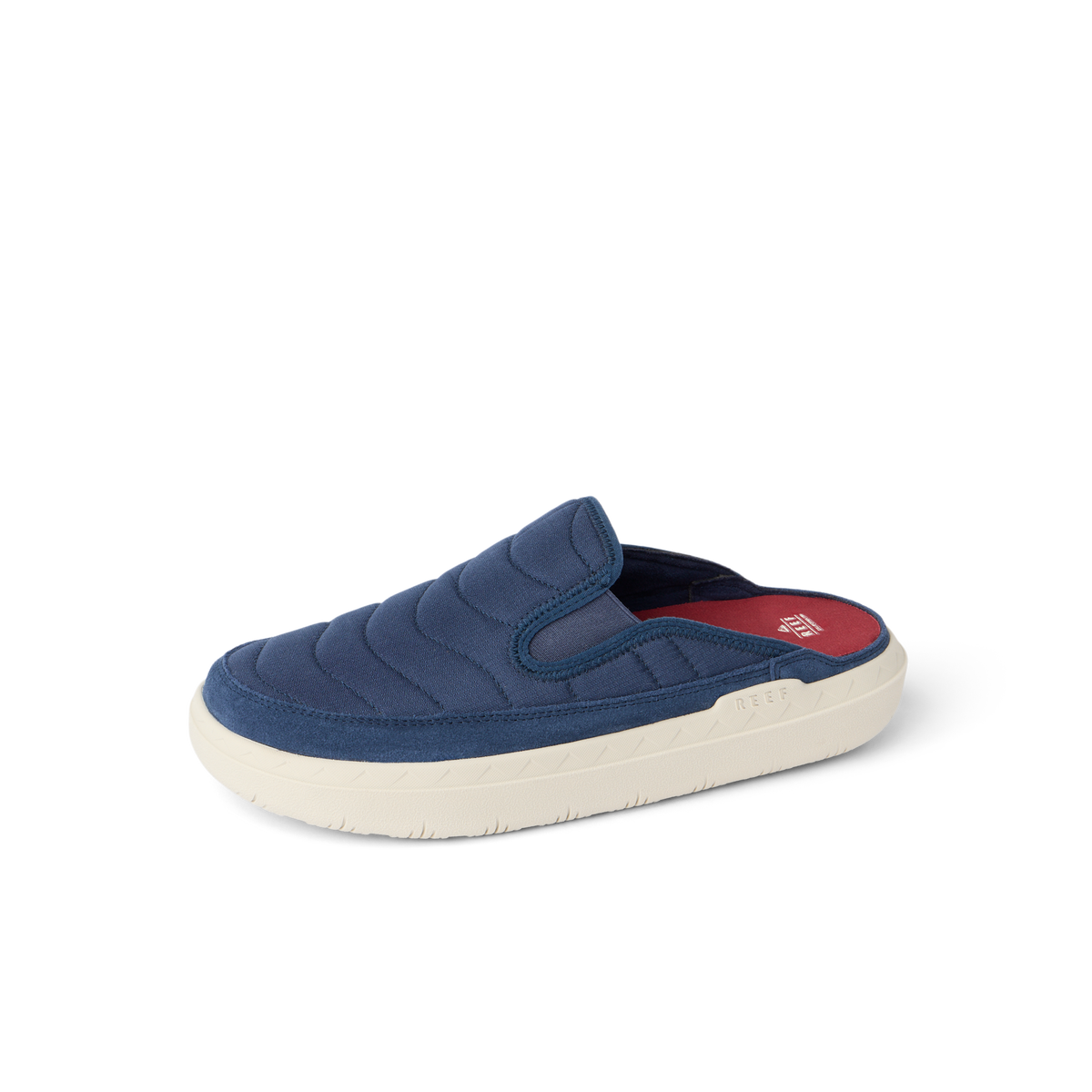 Rambler Kicker mule facing left in navy with cushioned memory foam footbed and lightweight textured EVA sole for everyday comfort