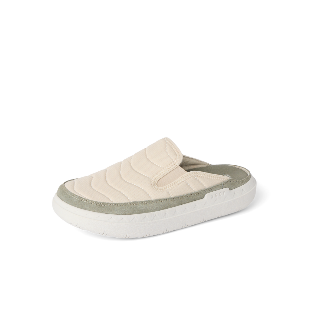 Rambler Kicker mule facing left with oatmeal upper, cushioned memory foam footbed, and lightweight EVA outsole for all-day comfort