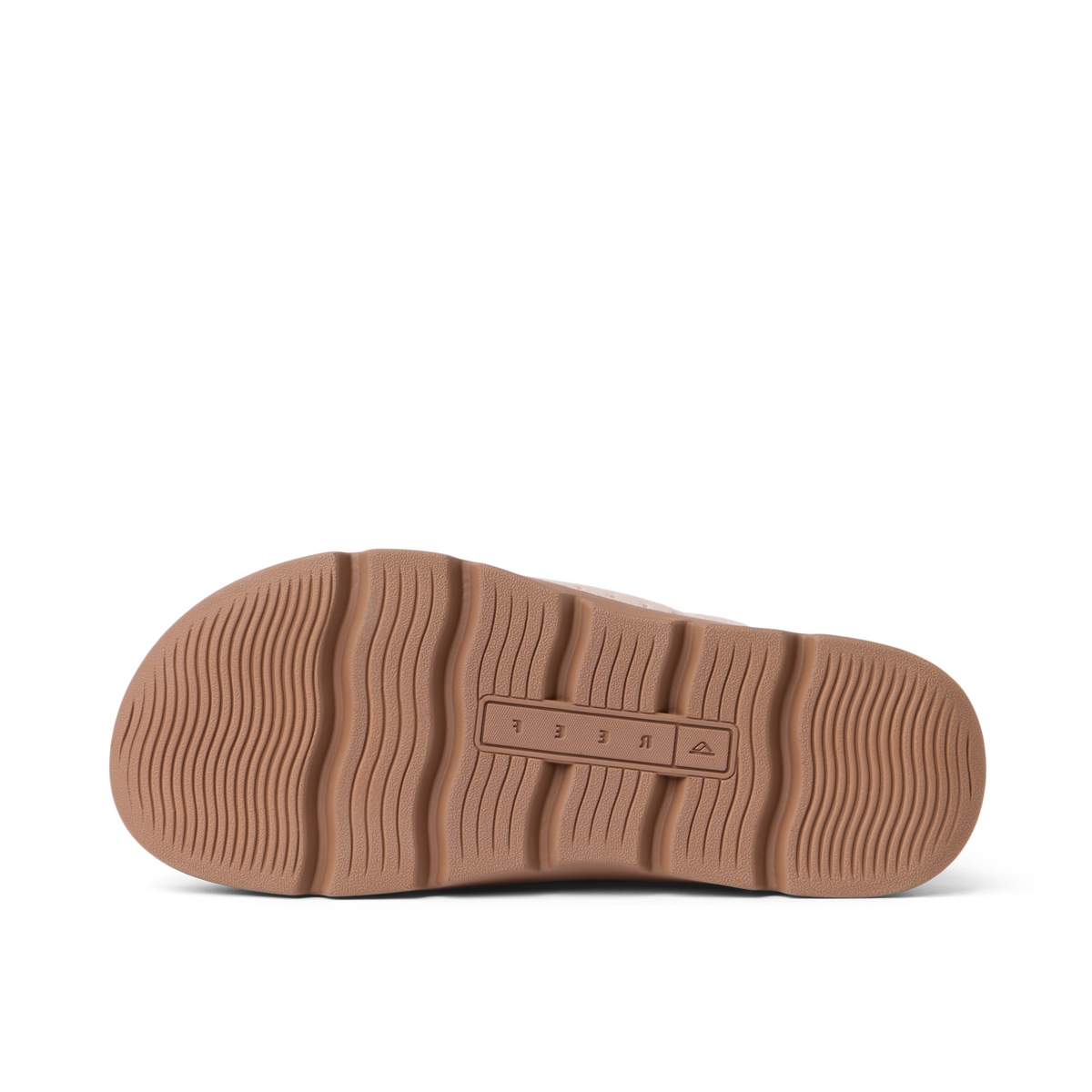 Vista Luxe Mariana outsole facing up, light taupe rubber sole with wave-inspired tread for durable beach-ready traction and comfort