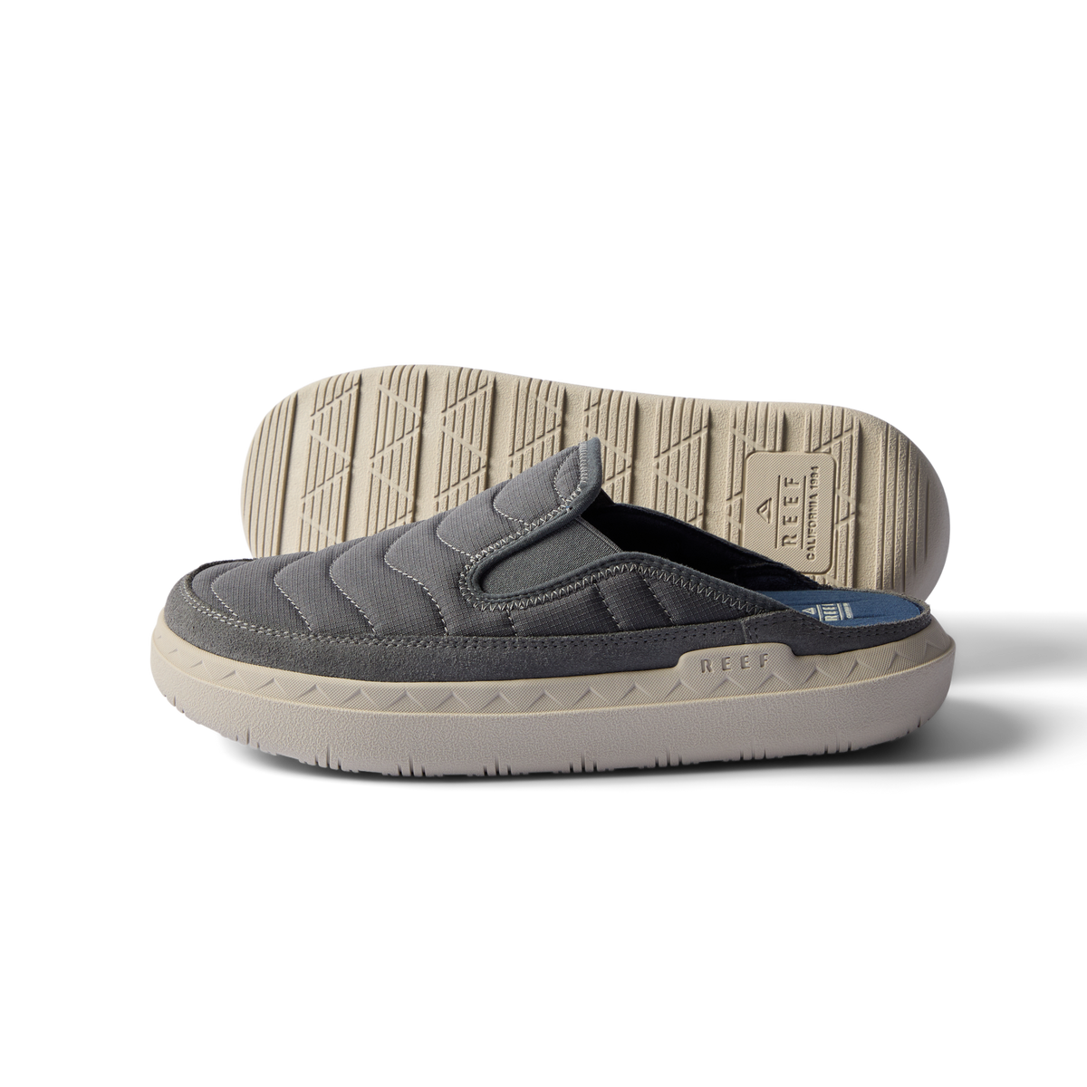 Rambler Kicker slippers side view facing left with grey cushioned upper and lightweight textured outsole for all-day comfort