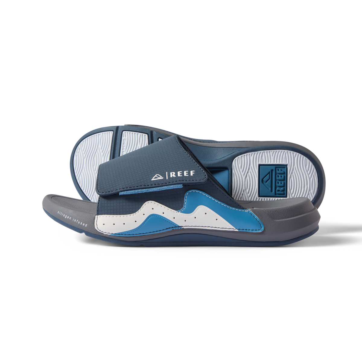 Pair of men's Cruiser Slide sandals facing right, showing top and sole, with extra cushioning and anatomical arch support.