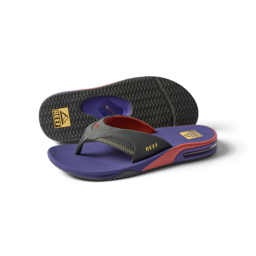 Fanning men's sandal showing right side angle with purple footbed, black strap, and textured sole for beach comfort and support.