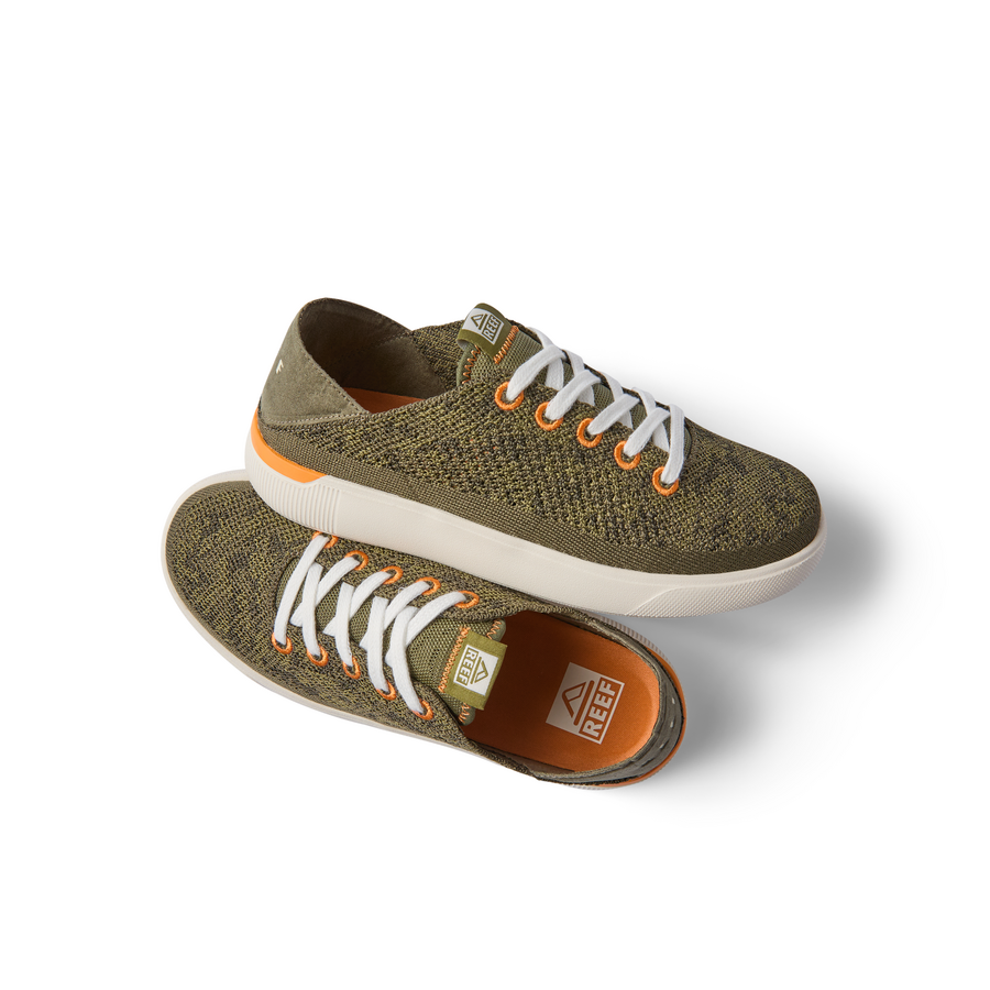 Kids Neptune unisex sneaker pair in camo knit with white laces, shown top and side view, highlighting comfort and beach style.