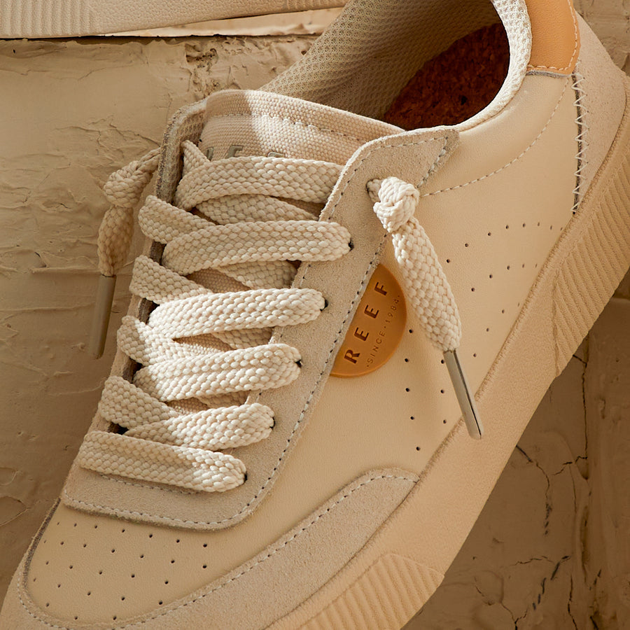 Close-up of the left Lay Day Seas sneaker facing right in sand multi with extra cushioning and anatomical arch support.