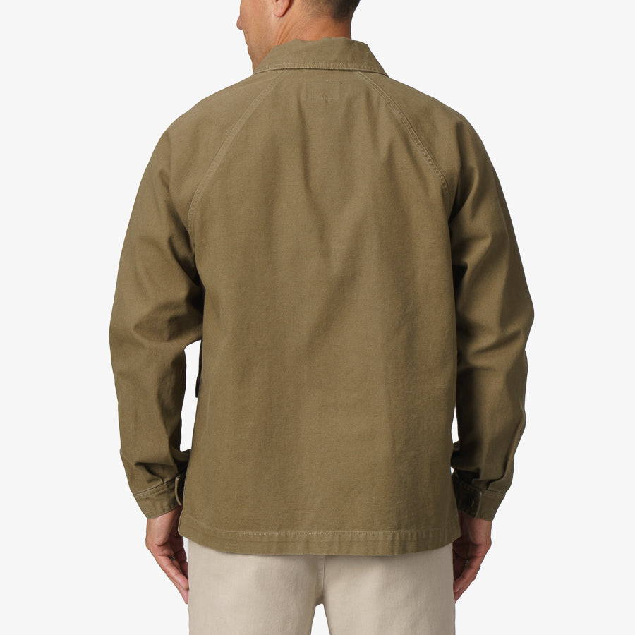 Back view of Landon Coat in olive green, showcasing durable, comfortable fabric designed for active beach lifestyles.