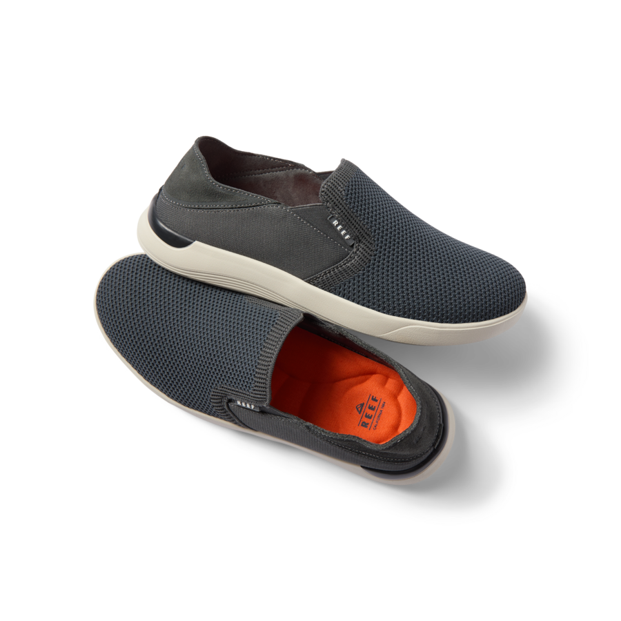 Neptune Slip-On men's slip-on shoes showing top mesh upper and right shoe side with cushioned sole, beach-inspired comfort.