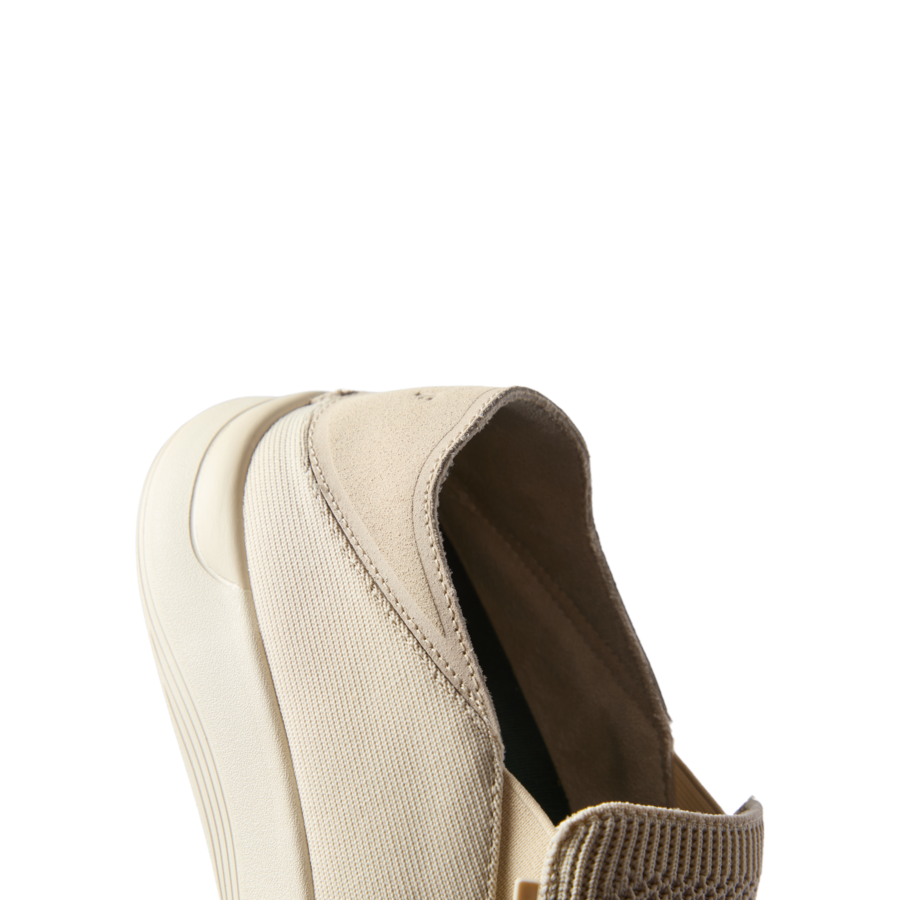 Neptune Slip-On shoe facing left, close-up on heel with soft-rebound cushioning and anatomical arch support for beach comfort.