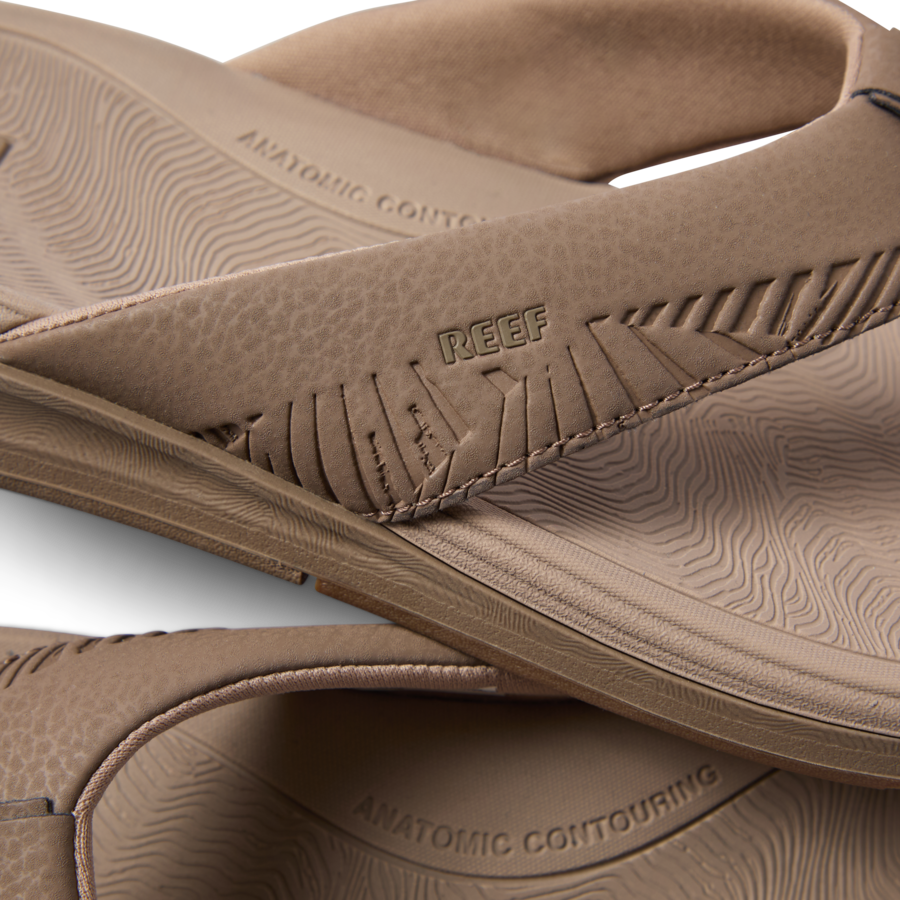 Close-up of the tan Offshore sandal strap and footbed facing left, highlighting anatomical arch support and cushioning.