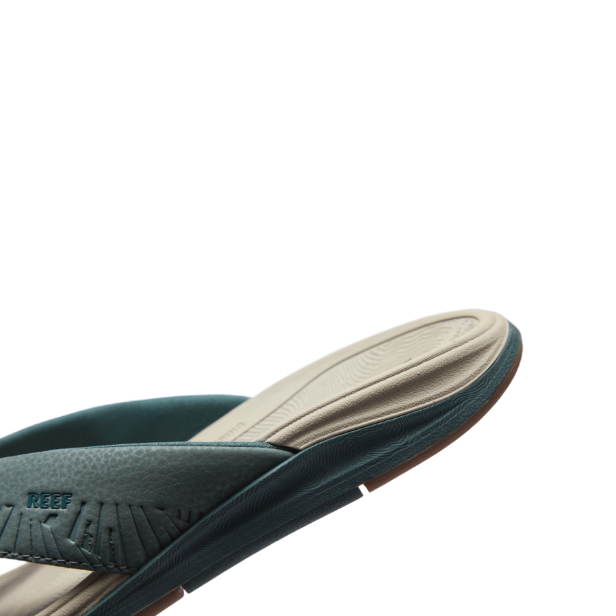 Offshore men's sandal facing right, showing the side and footbed with anatomical arch support and soft cushioning.