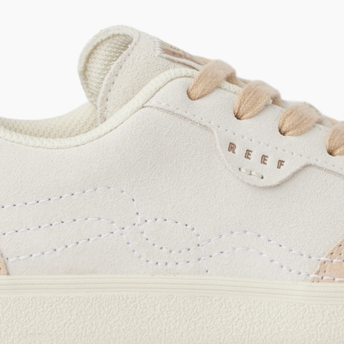 Close-up of the left side of the Boardwalk Callie sneaker showing soft-rebound cushioning and surf-inspired design.