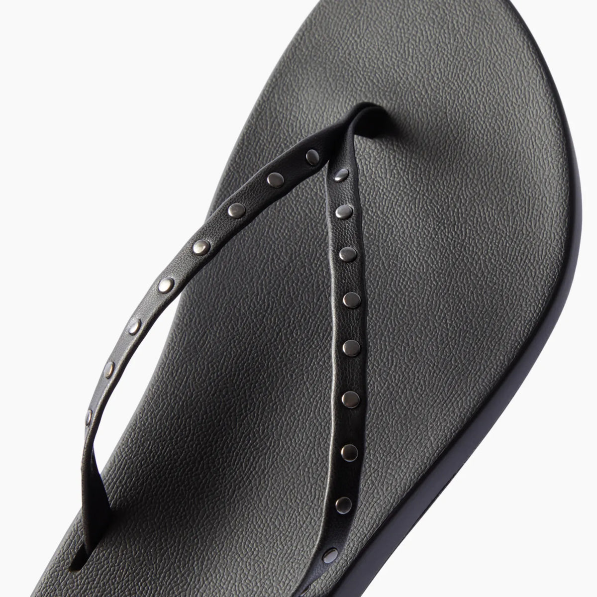 Top view of black Cushion Slim Studs sandal for women with studded straps and comfort cushioning for beachwear.