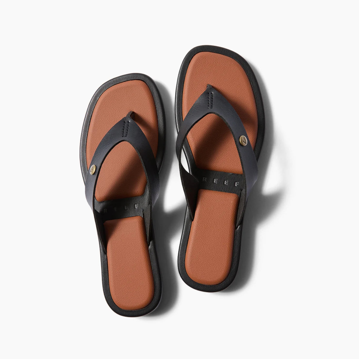 Willow Ella women's black sandals top view showing brown footbed and anatomical arch support for beach comfort
