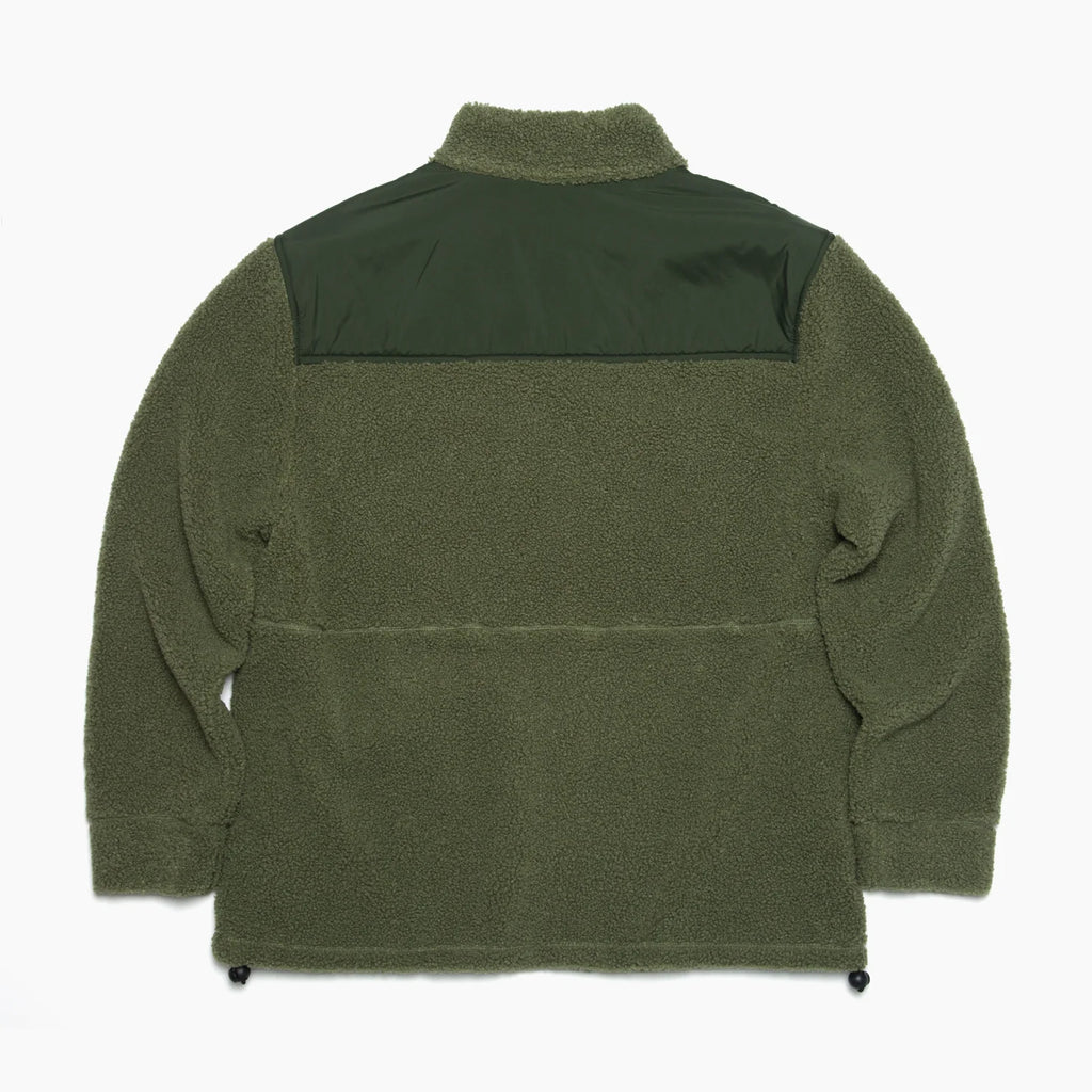 Back view of the olive green Cooke Sherpa Jacket showing soft sherpa fabric and smooth shoulder panel for beach-inspired comfort.