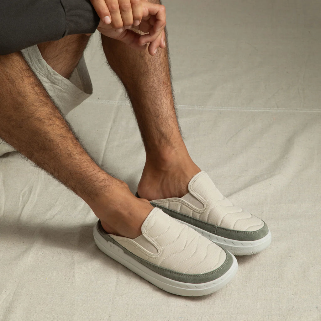 Rambler Kicker mule facing right in off-white with cushioned memory foam footbed and lightweight EVA outsole for all-day wear