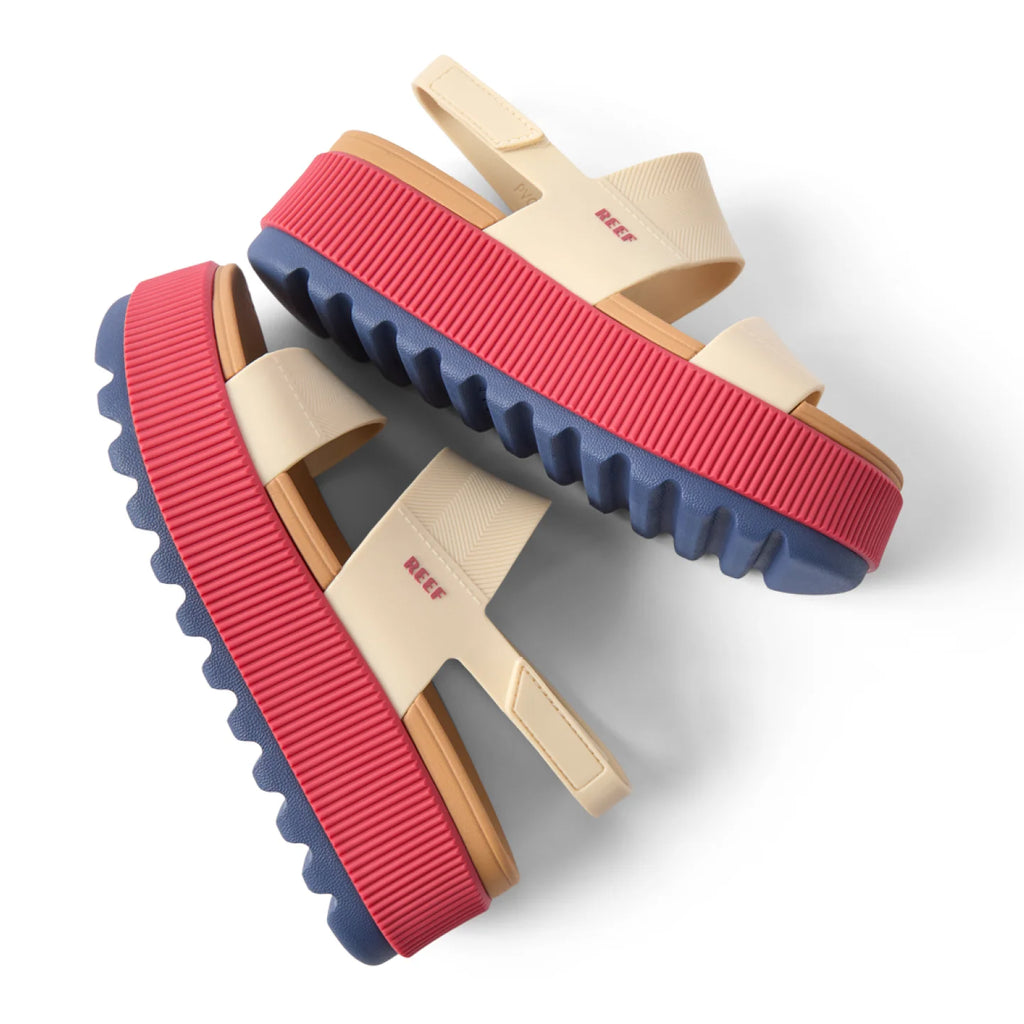 Pair of Water Vista Higher sandals for women, side view showing red and navy water-friendly soles with arch support.
