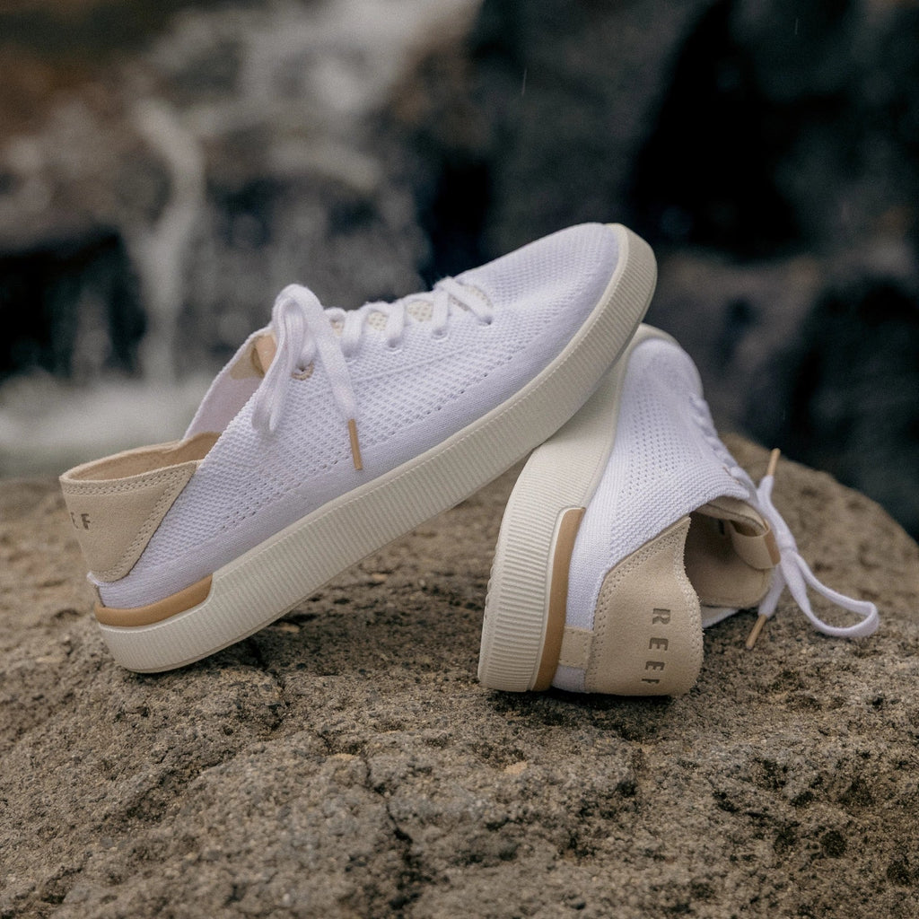 White Reef Neptune sneakers for women showing left side and back with anatomical arch support and cushioning