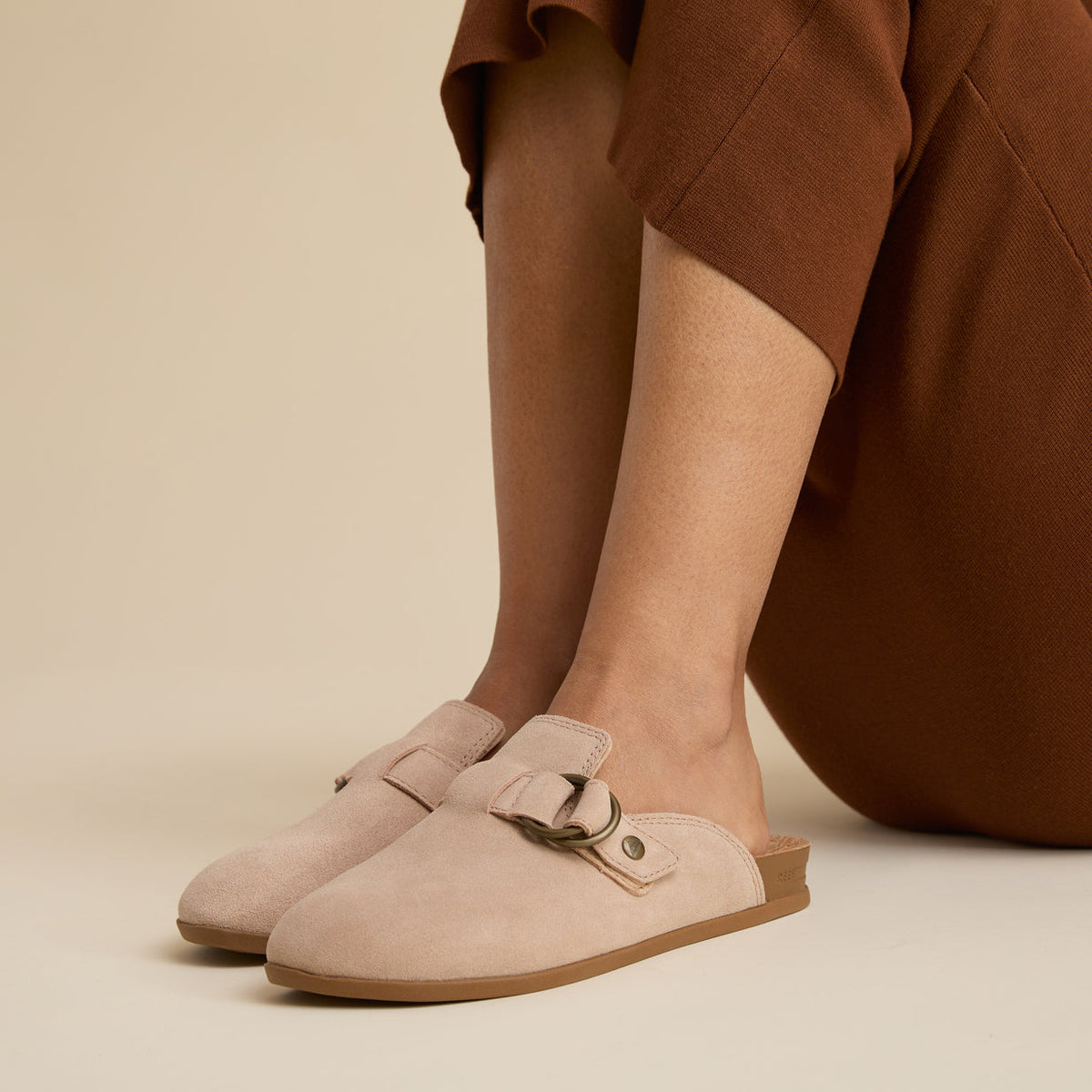 Vista Serenity women's suede slip-on footwear facing left, showing side and top with soft-rebound cushioning and arch support.