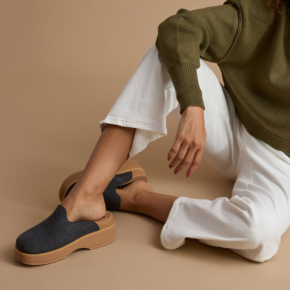 Vista Skye charcoal platform slip-on facing right, close-up of side and top showing comfort and arch support