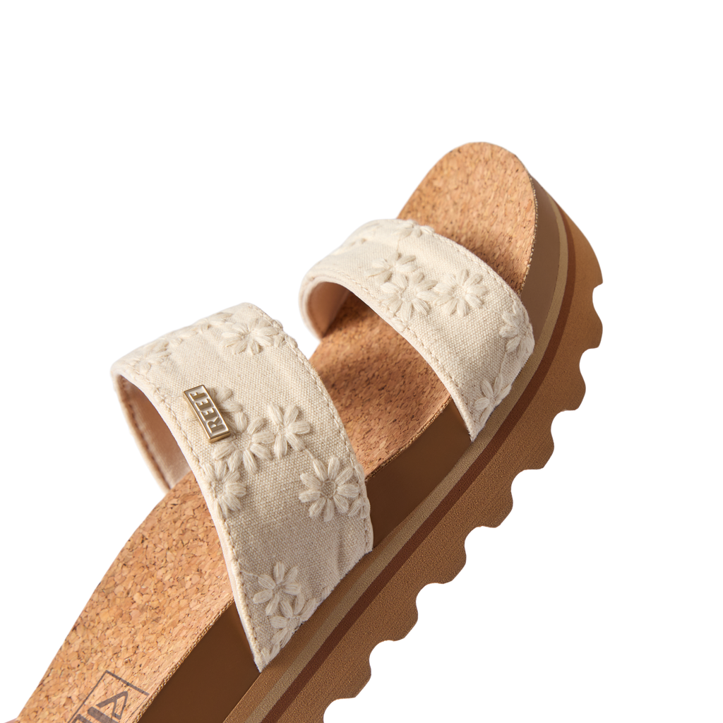 Cushion Vista Hi sandal facing left, showing cork footbed and floral embroidered straps, designed for comfort and durability.