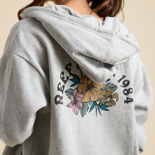 Brittany Fleece Full Zip hoodie back view showing floral REEF 1984 logo, soft fabric, and comfortable beach-inspired design.